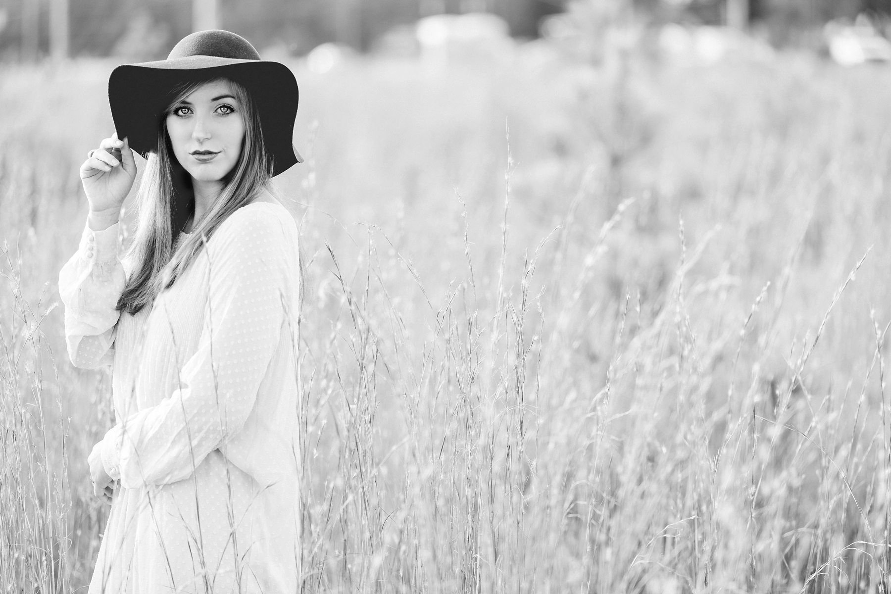 Black and white senior portrait by Elle Danielle Photography