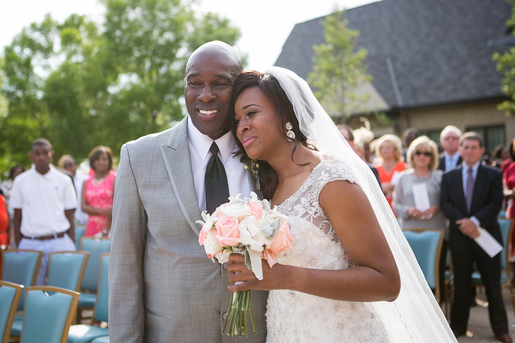 A bride with her father by Elle Danielle Photography