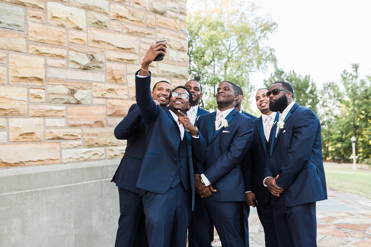 Groomsmen selfie on wedding day